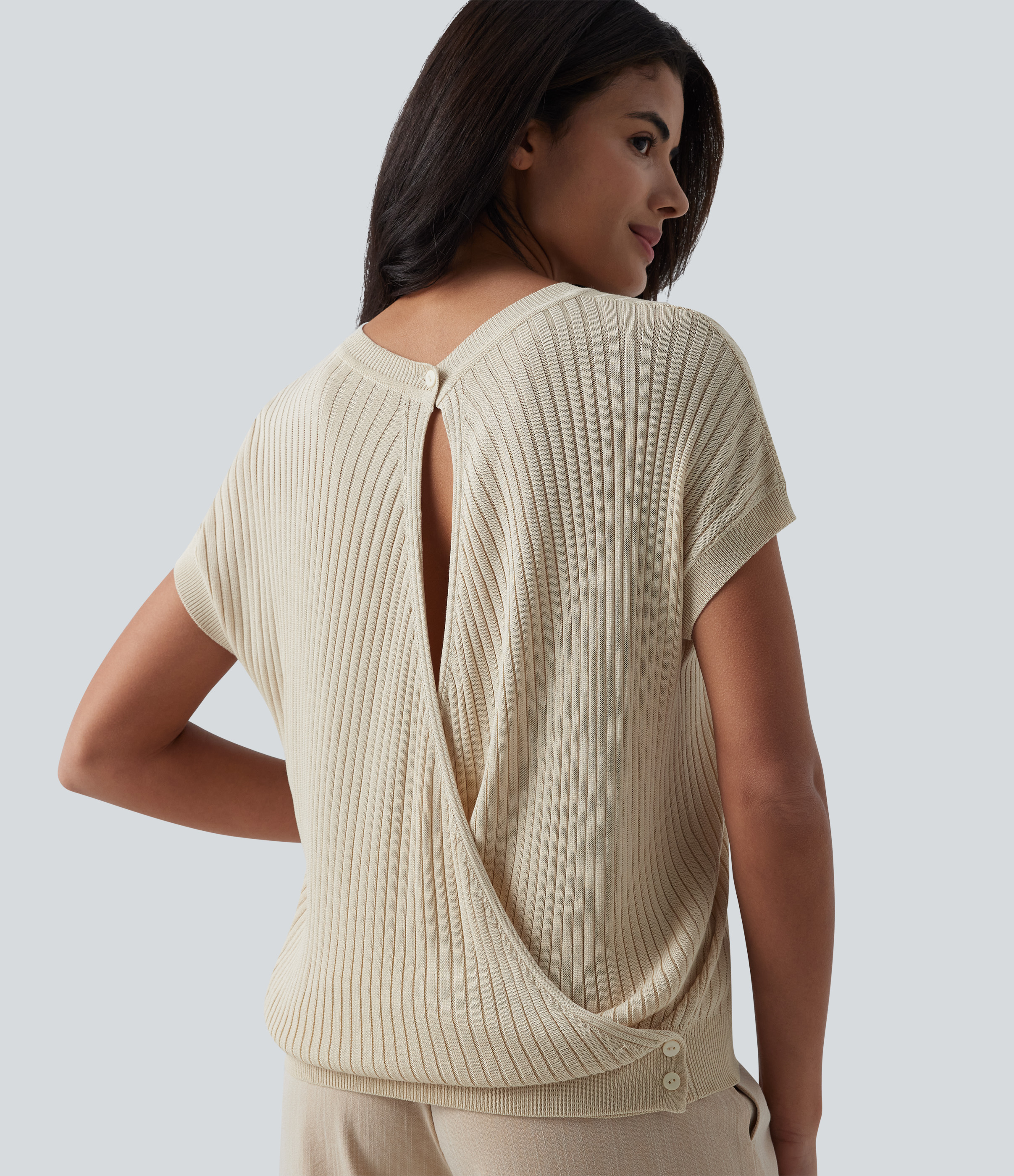 Pull casual col rond manches chauve-souris croisé dos nu