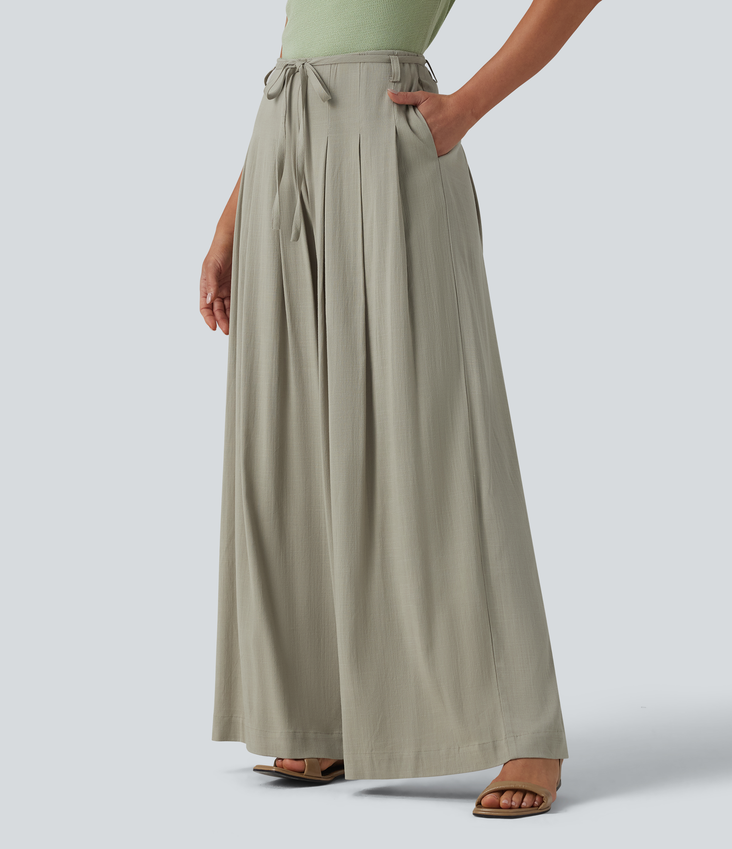 Pantalon large fluide taille mi-haute aspect lin avec ceinture et poches