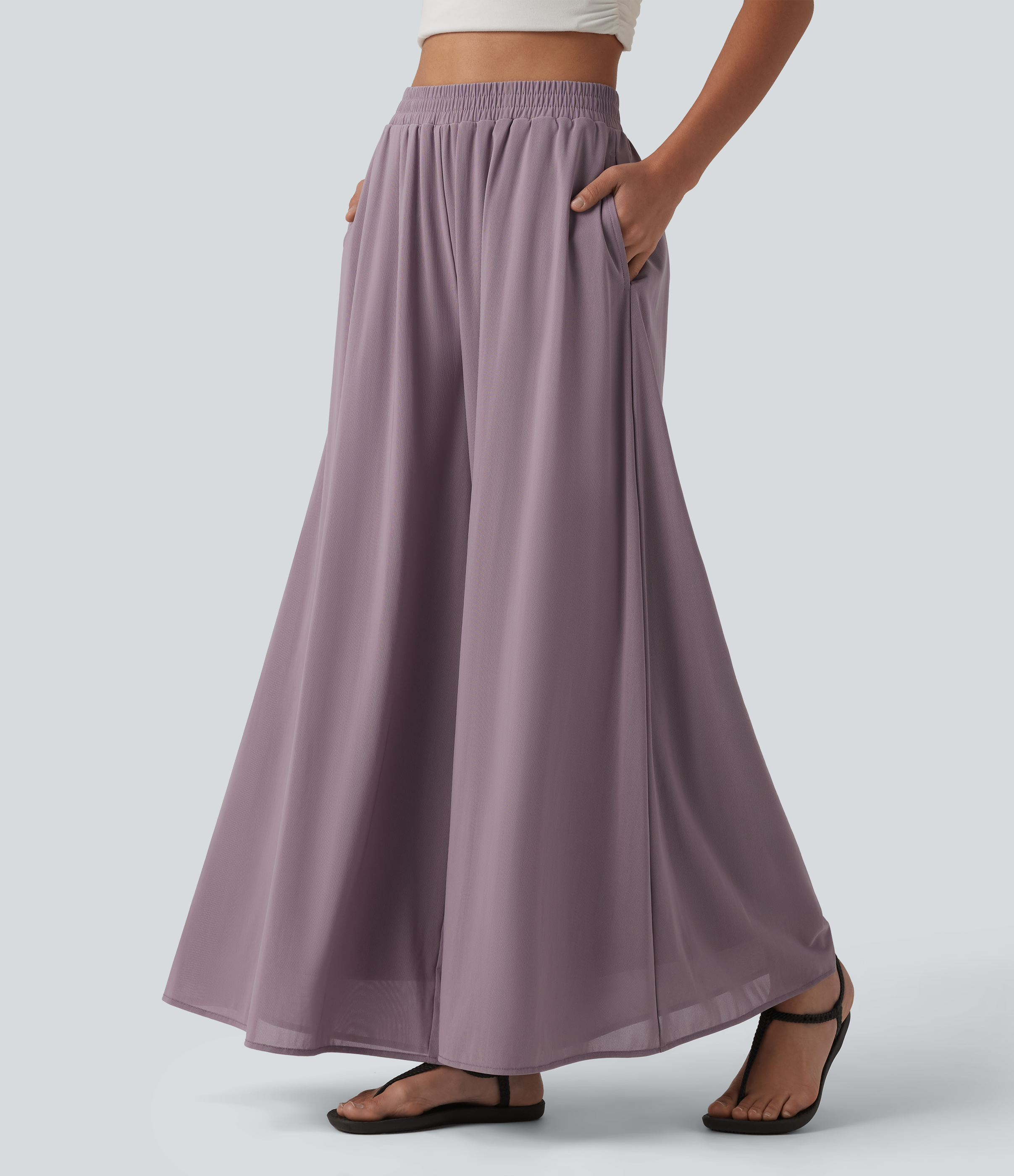 Pantalon fluide et ample avec superposition en mesh, poches latérales et taille haute