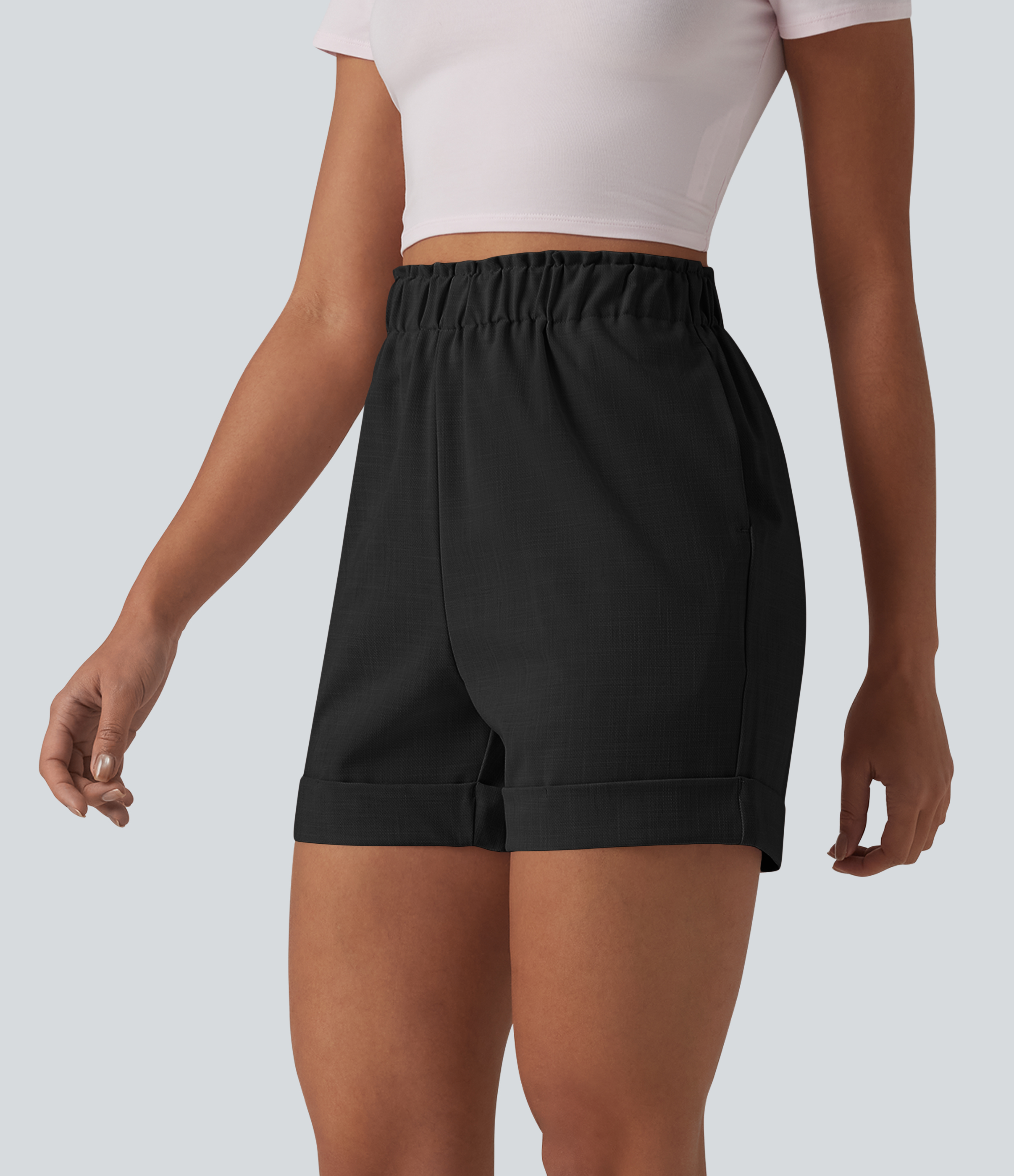 Shorts casuais de cintura alta com babados, toque de linho e bolsos.
