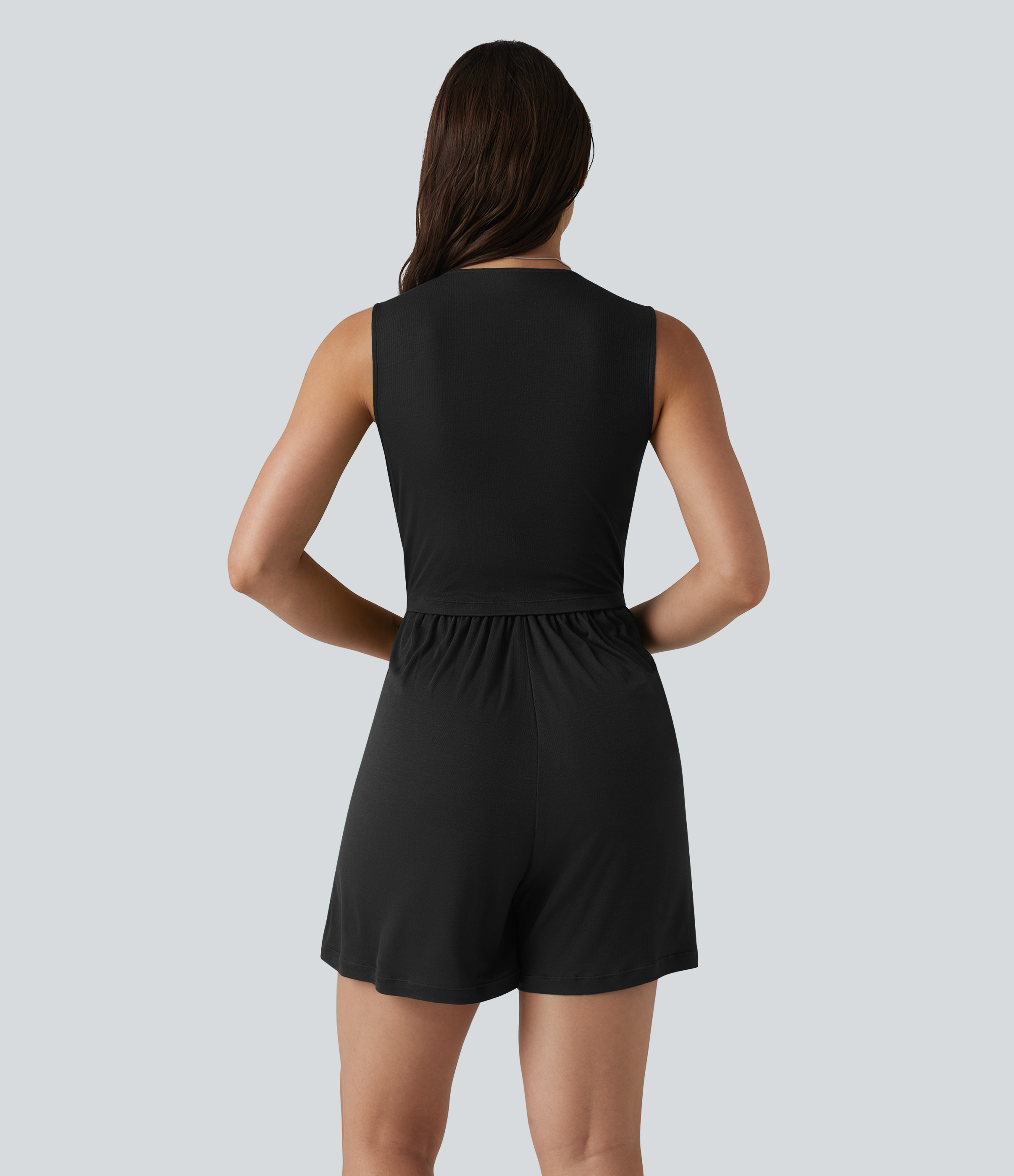 Schwarz Ärmelloser, gerippter Jumpsuit mit V-Ausschnitt, Seitentaschen und integriertem BH - Easy Peezy / 2