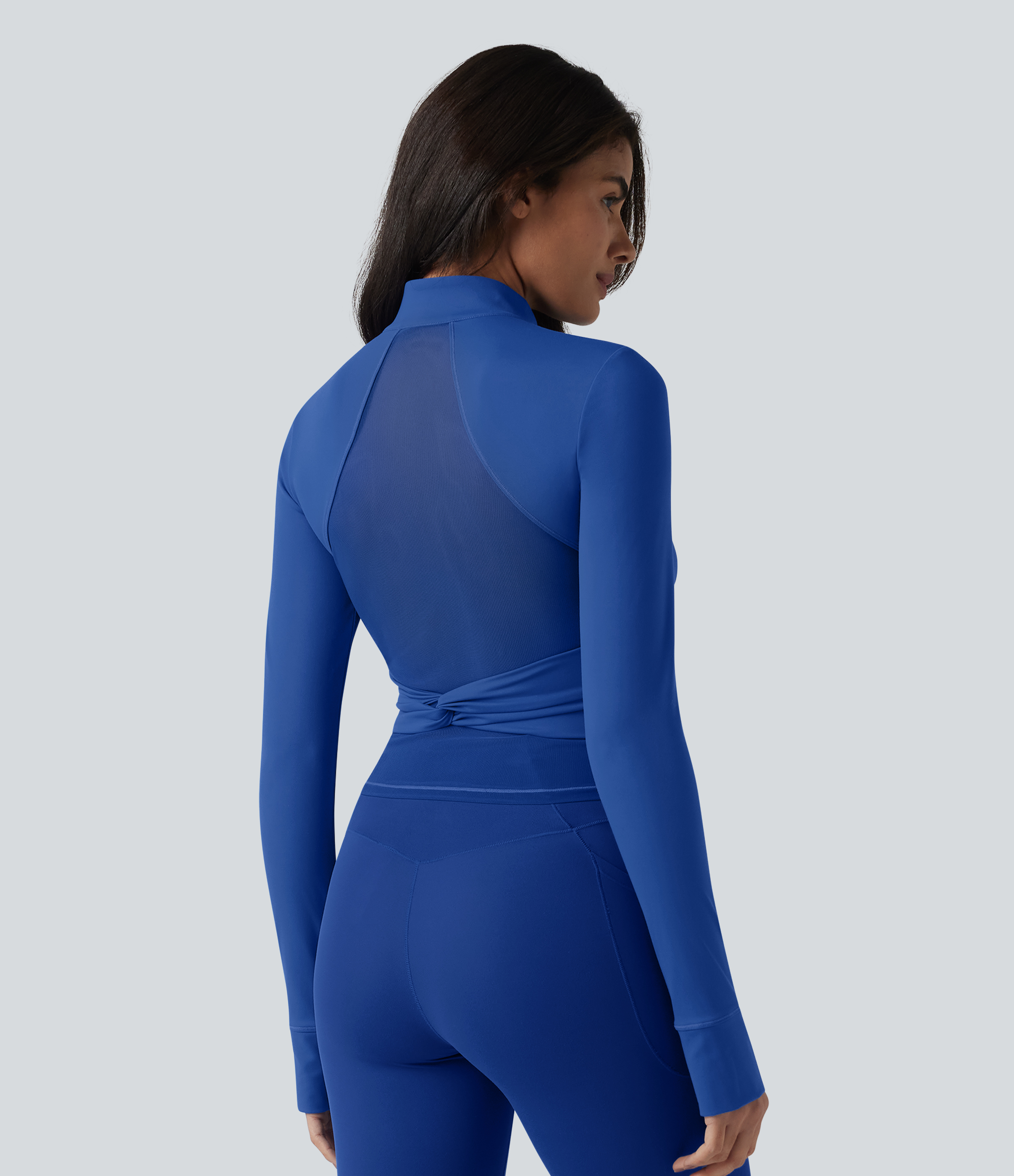 Softlyzero™ Plush - Yogajacke mit Stehkragen, Seitentaschen, langen Ärmeln, Daumenlöchern, atmungsaktivem Mesh und gedrehtem Rückendesign