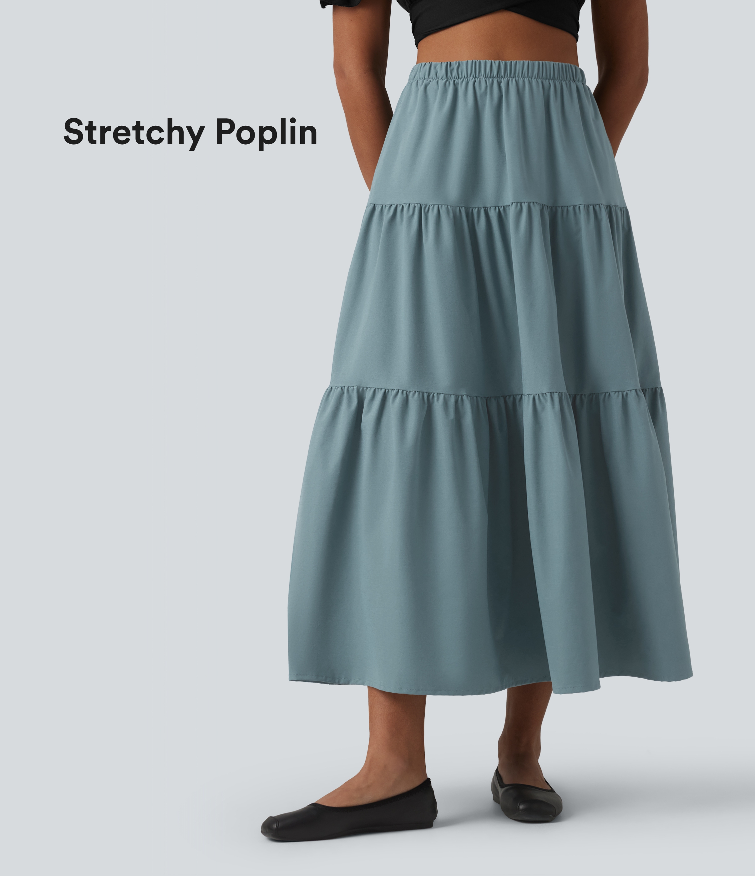 Lässiger Midirock in A-Linie aus elastischem Popeline mit hohem Bund und Seitentaschen