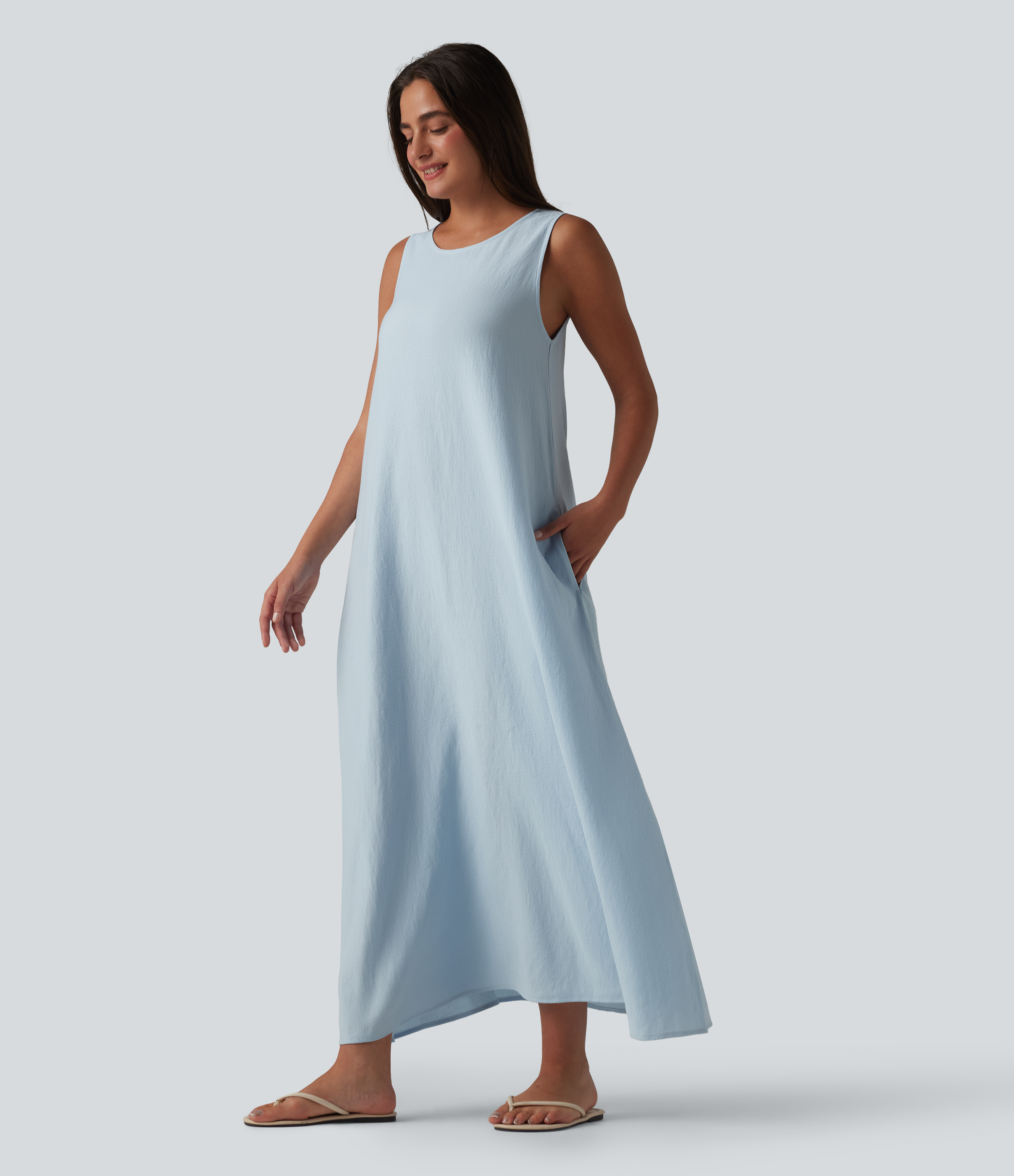 Robe débardeur midi unie sans manches à col rond et poches