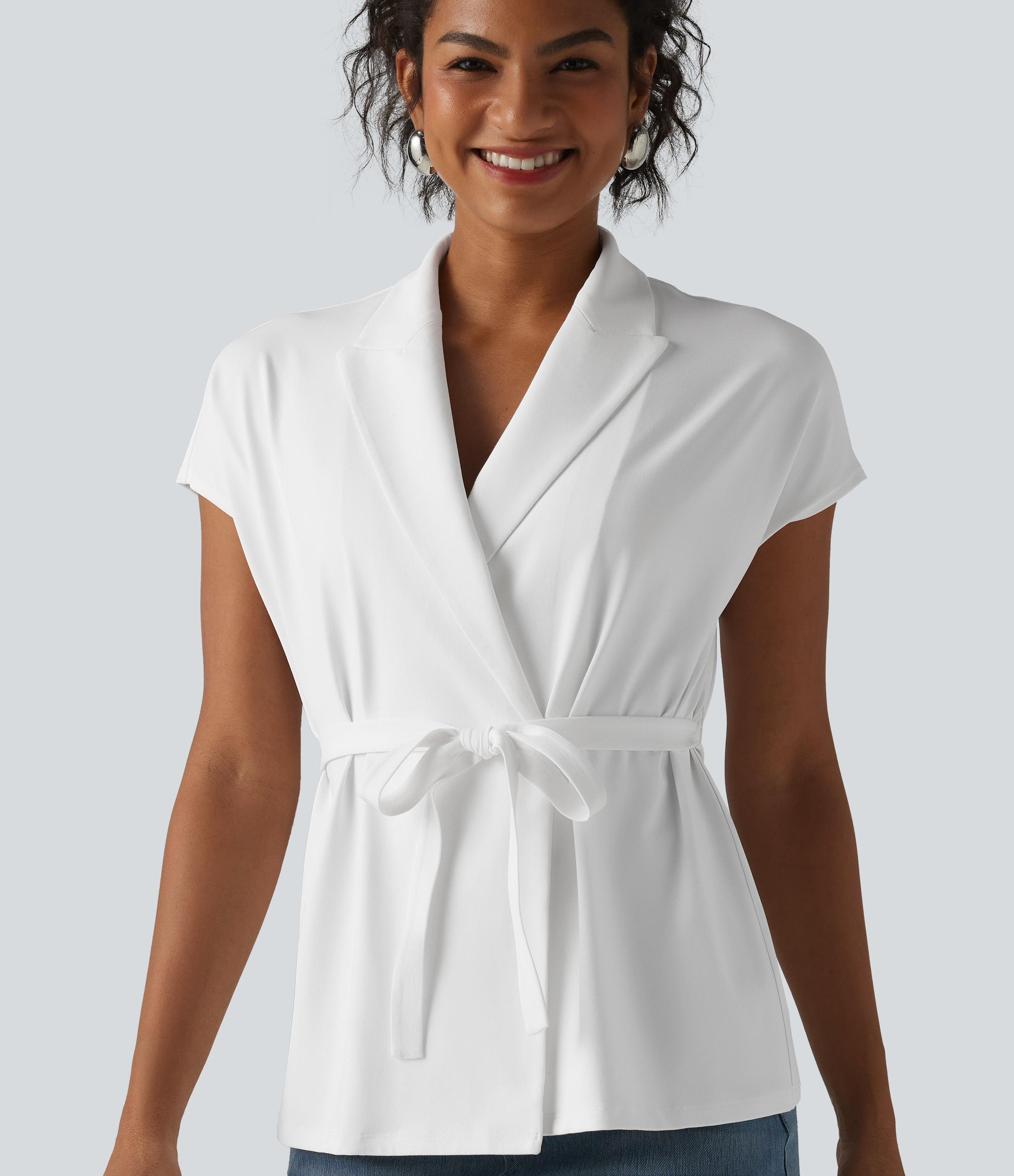 Top tailleur col châle manches courtes avec nœud sur le devant