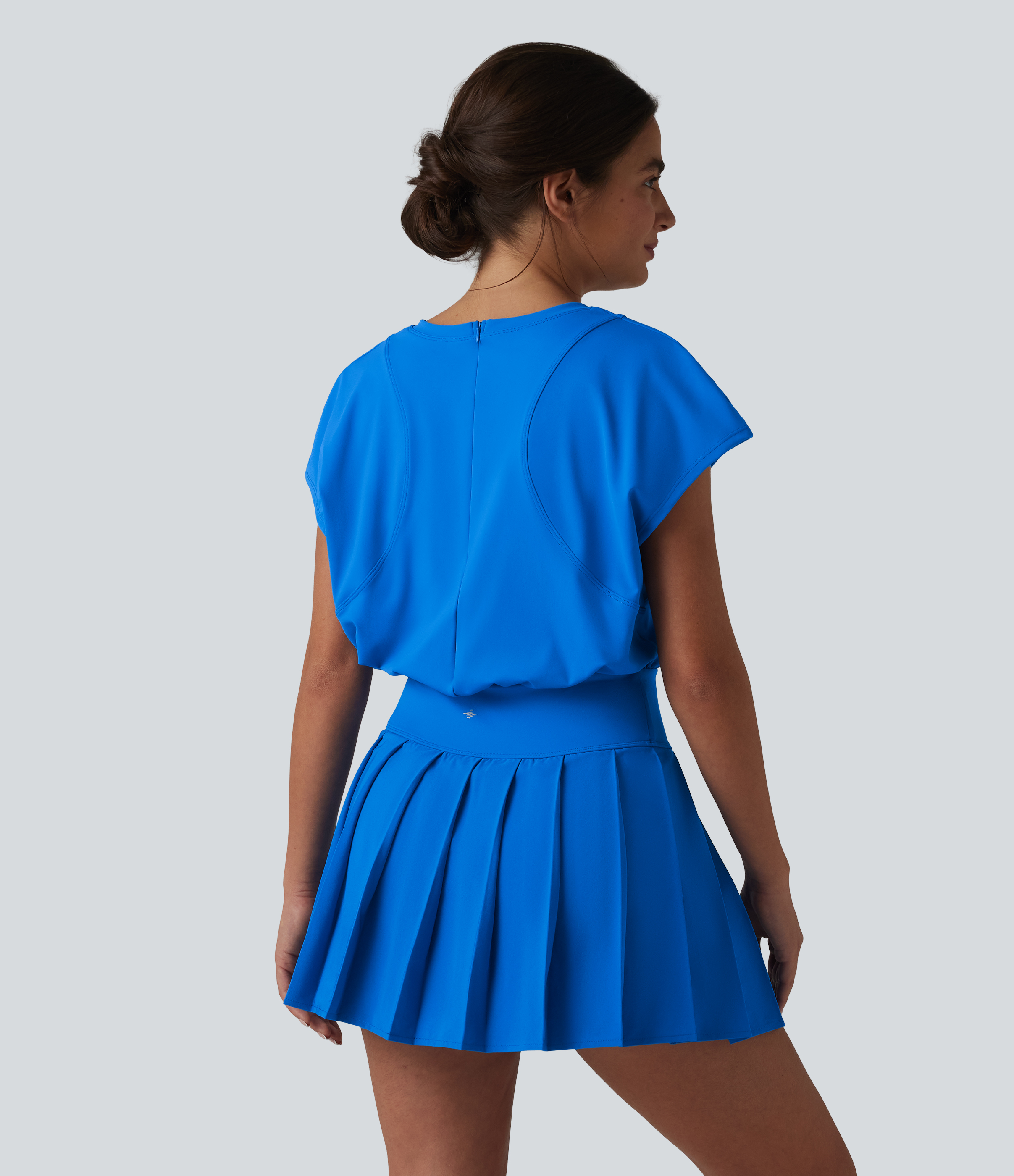 Pure Tile Blue Vestido deportivo mini 2 en 1 para tenis con escote en V, cremallera invisible, manga corta, bajo plisado y bolsillos / 2