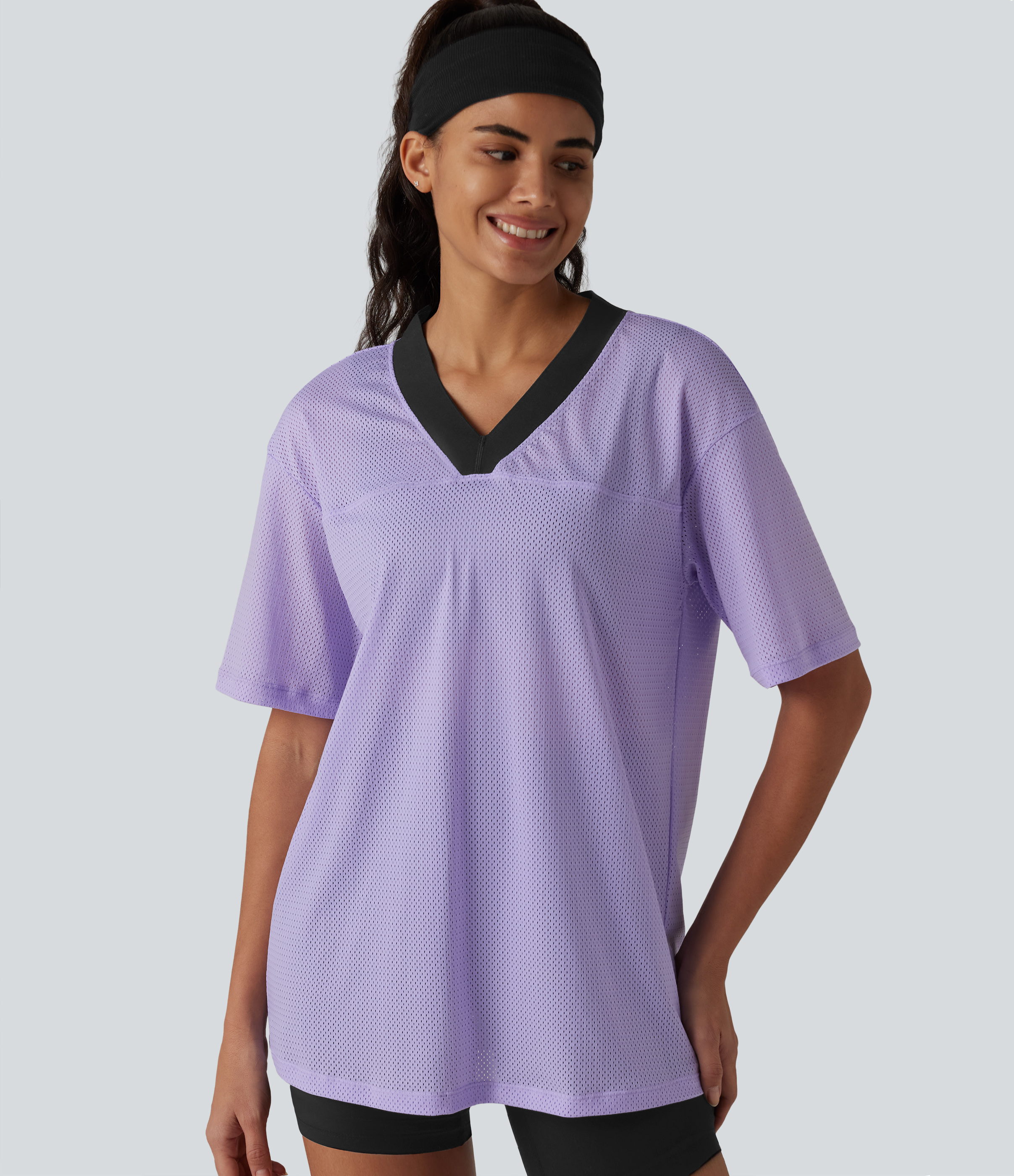 Haut de sport d'entraînement ample col V en maille respirante color block