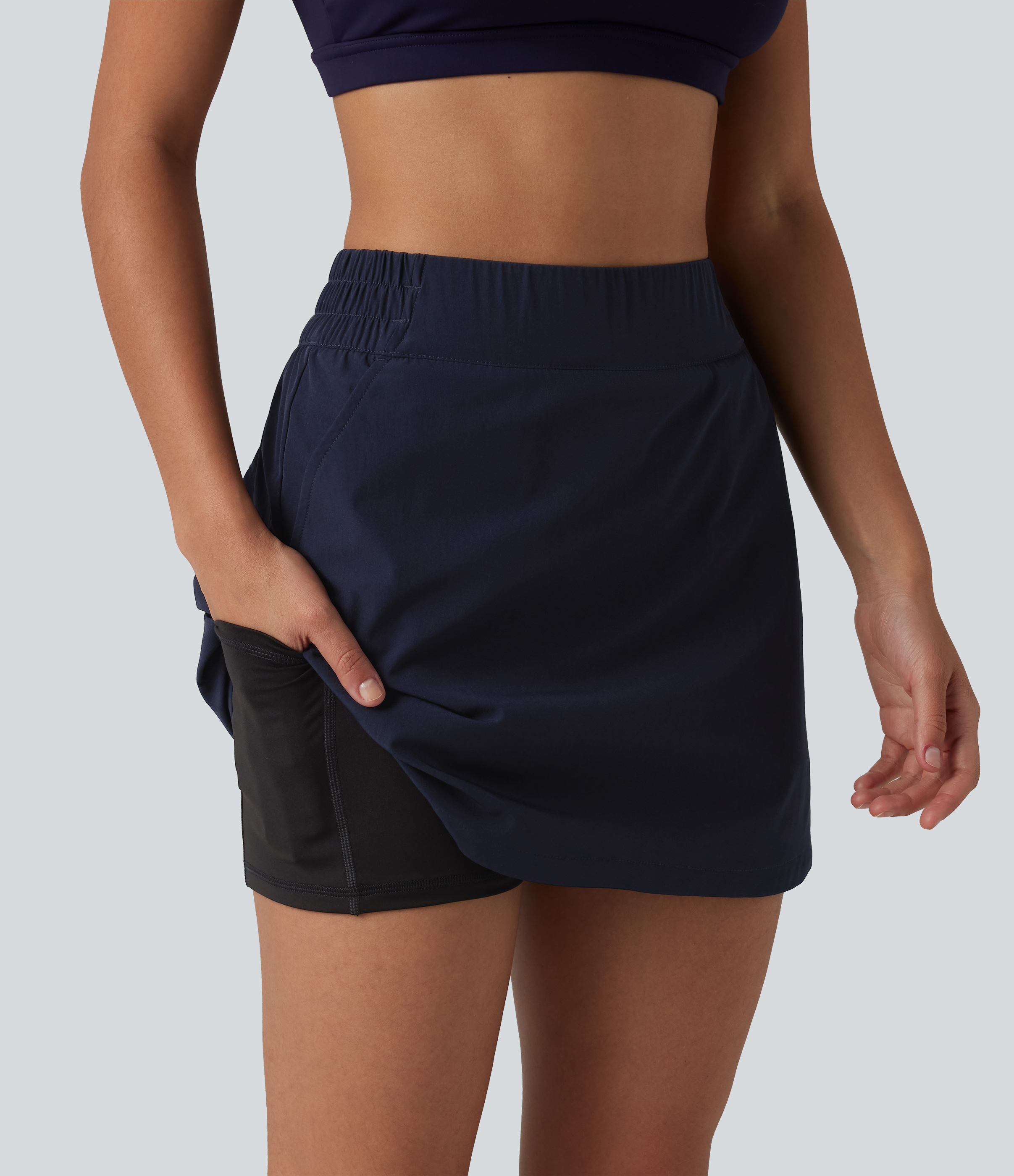 Jupe mini de randonnée 2-en-1 taille haute ourlet arrondi avec poches