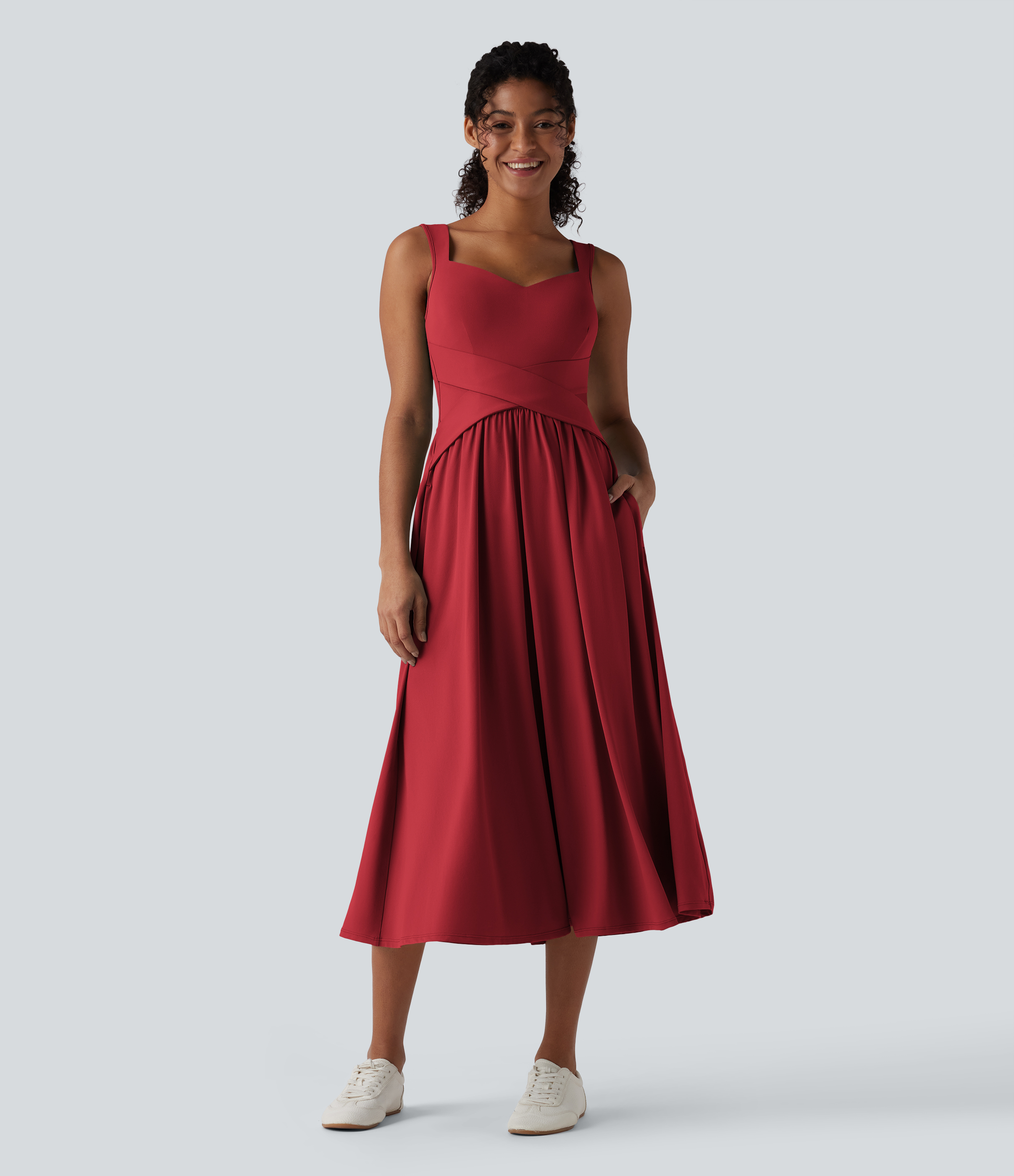 Robe midi fluide sans manches dos croisé ouvert avec poches