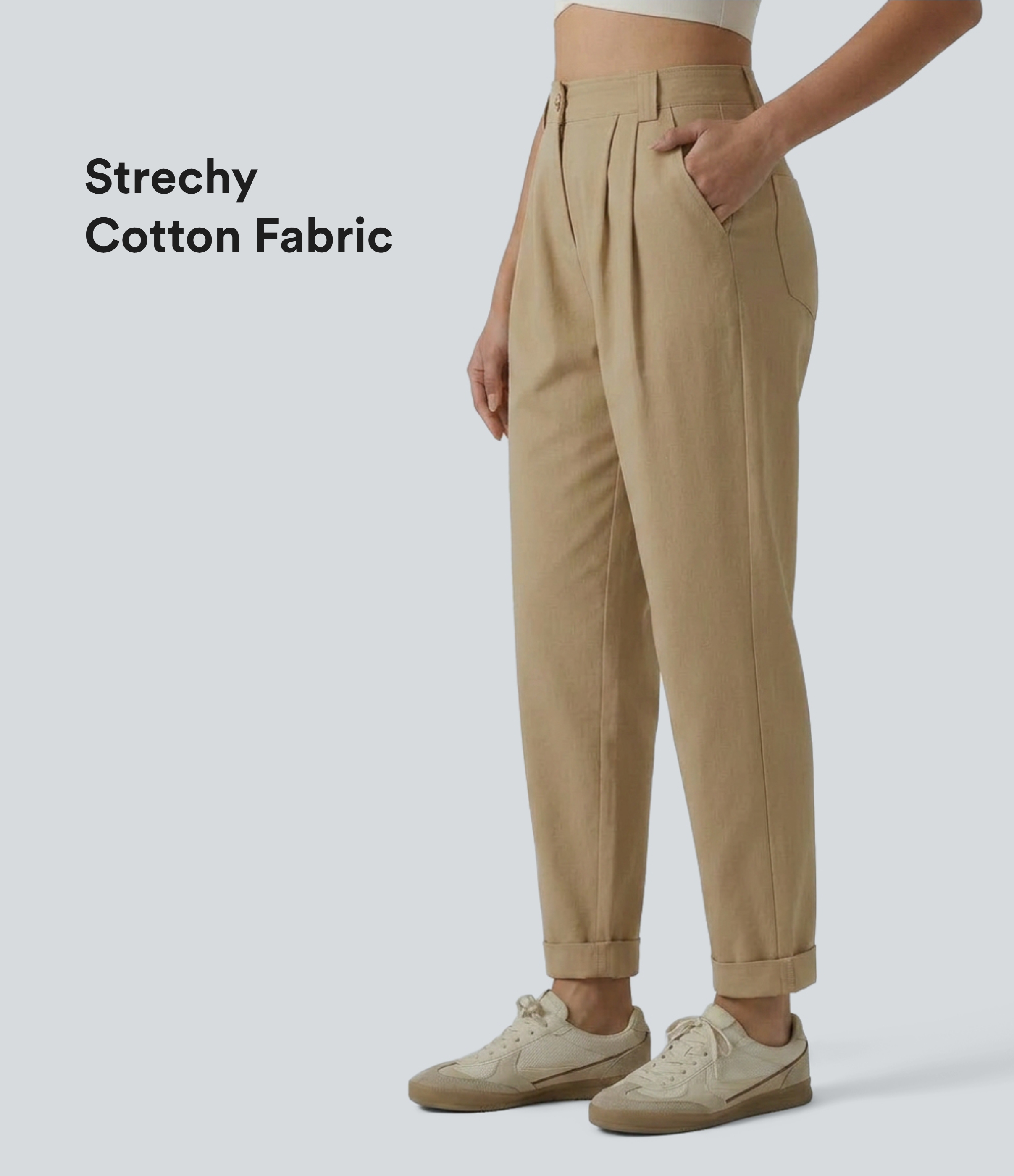 Schmal zulaufende Bürohose aus Baumwolle mit mittelhohem Bund, Seitentaschen und umgeschlagenem Saum