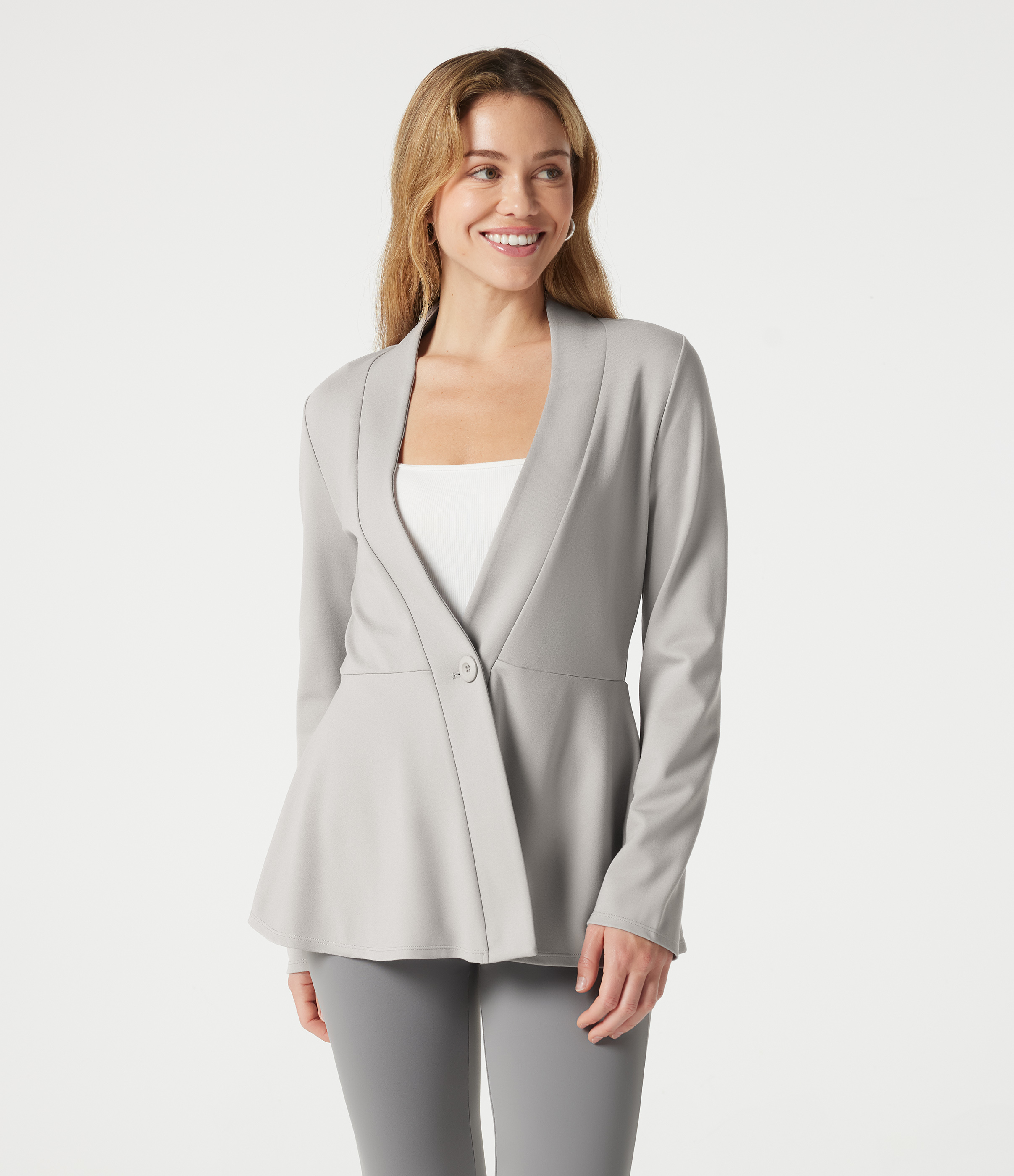 Veste péplum de travail col en V avec un bouton