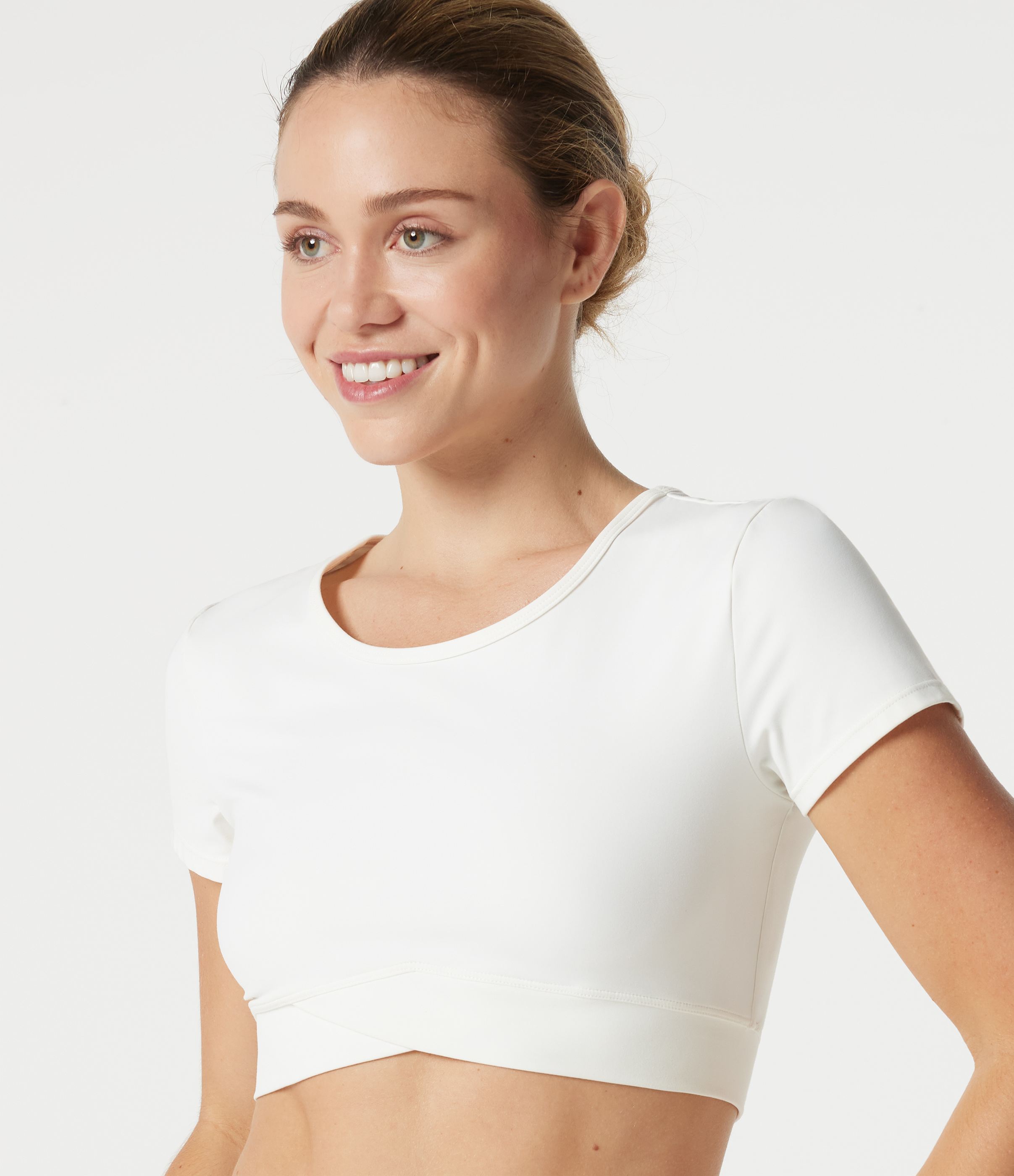 Softlyzero™ Plush Kurz geschnittenes Sportoberteil mit Crossover-Saum