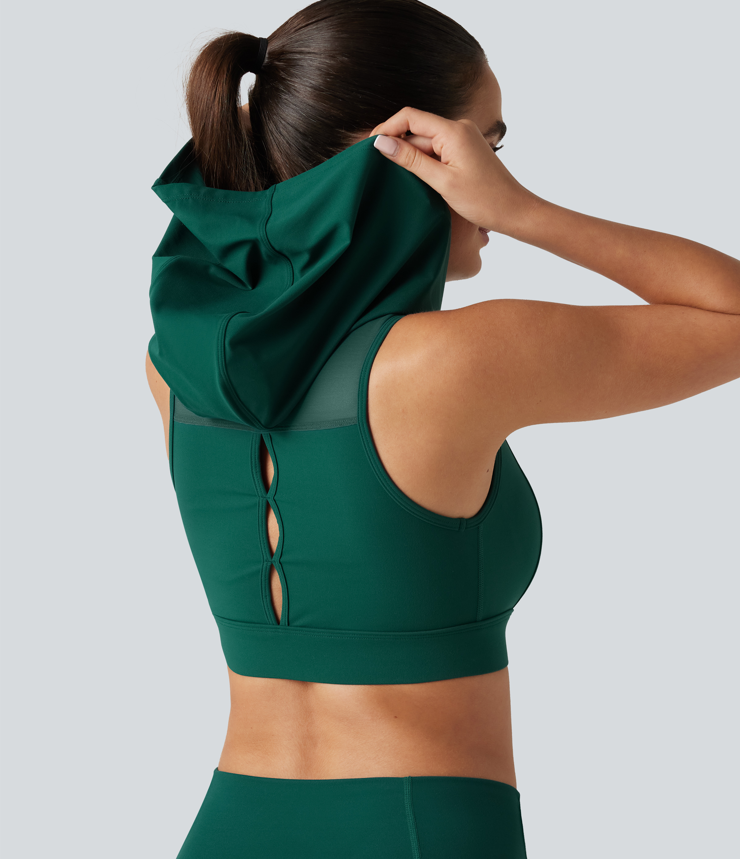 Halara UltraSculpt™ Brassière de running à maintien moyen, capuche, fermeture éclair, maille respirante, découpes, rembourrage intégré non amovible