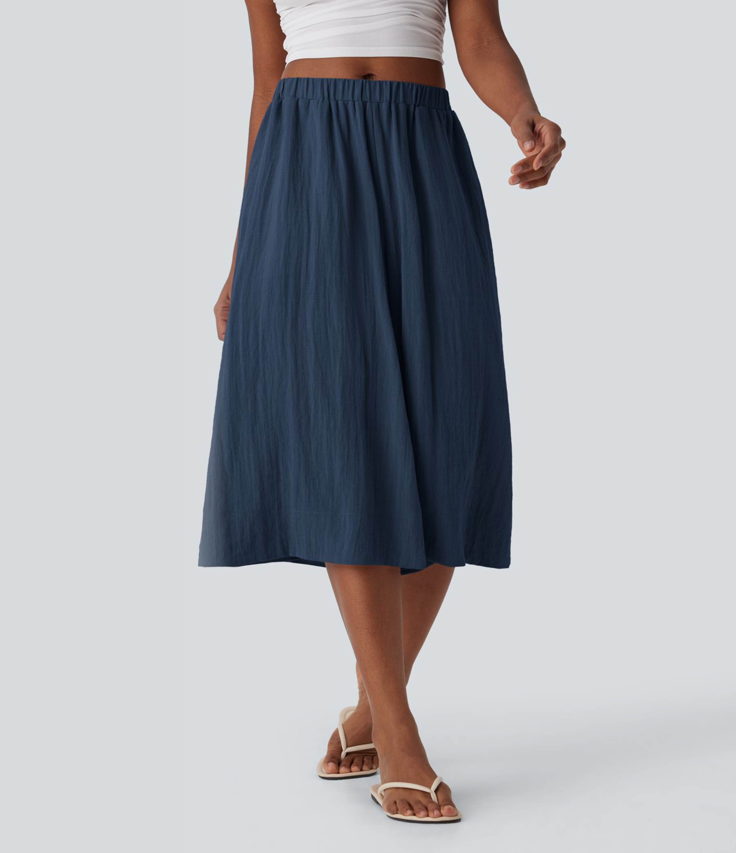 Pantalon fluide large taille mi-haute effet lin avec poche