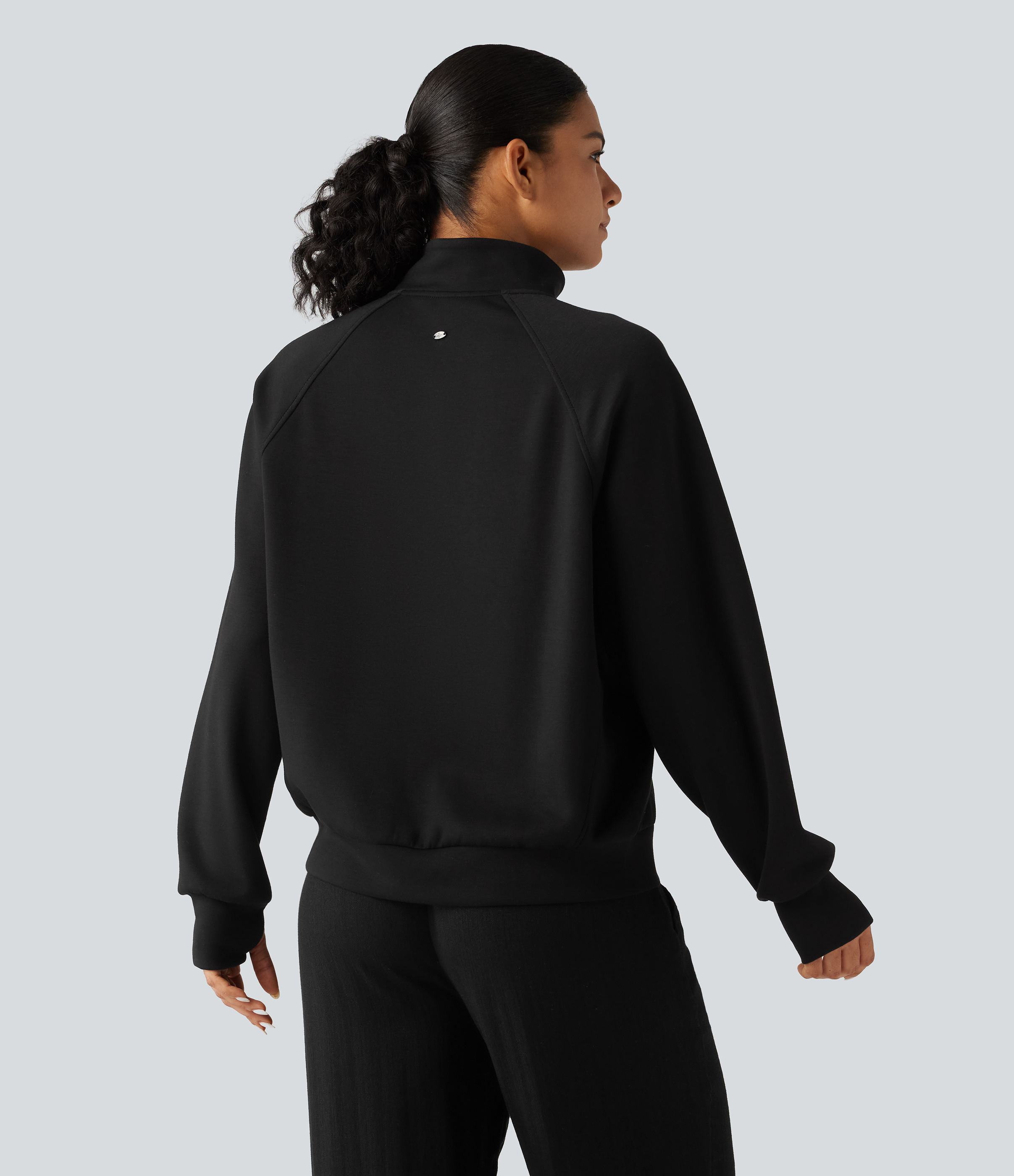 Noir Veste à col montant, zip double sens, manches longues avec passe-pouces et poches / 2