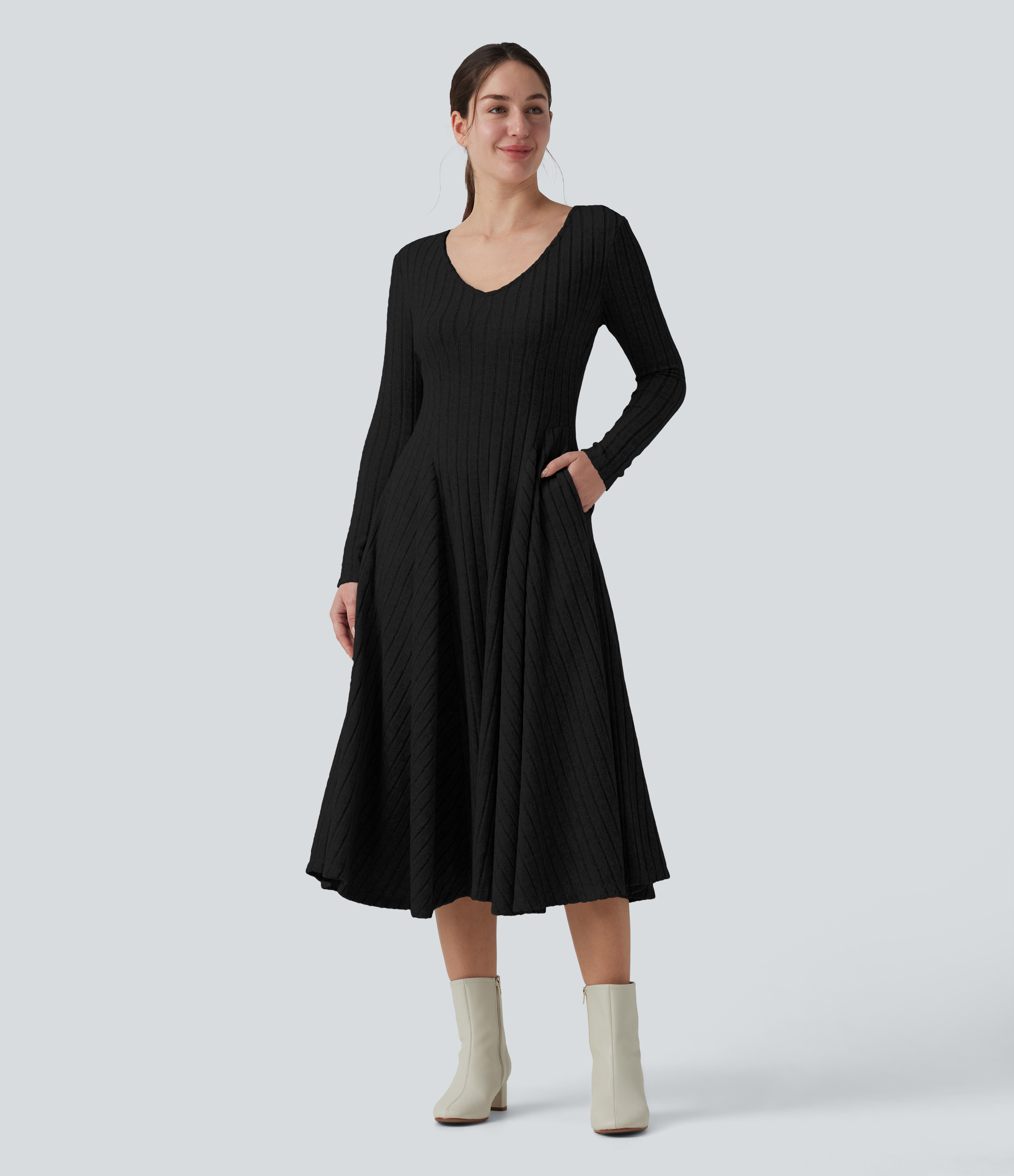Robe midi évasée en maille côtelée à encolure en V, manches longues et poches