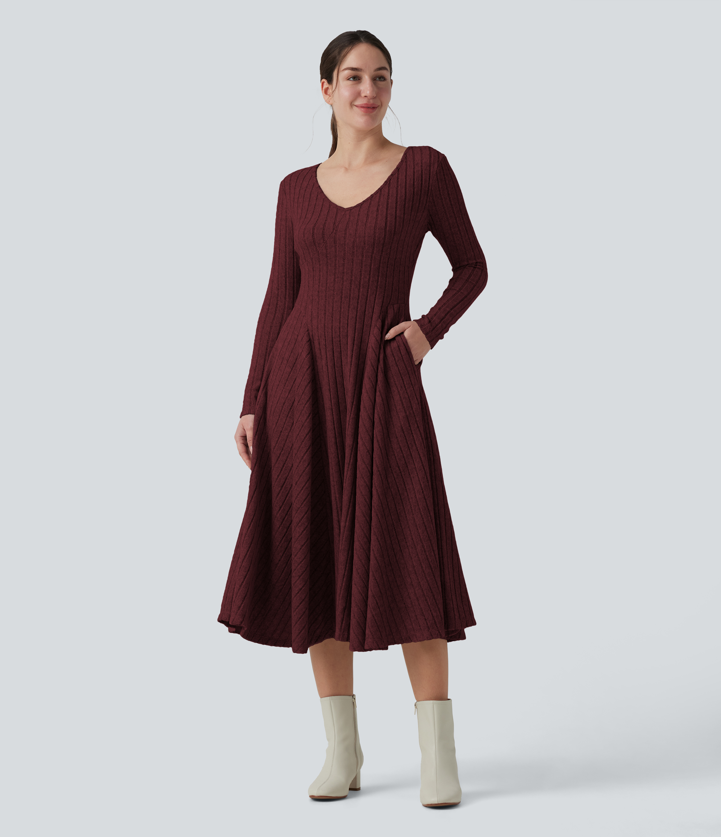 Robe midi évasée en maille côtelée à encolure en V, manches longues et poches