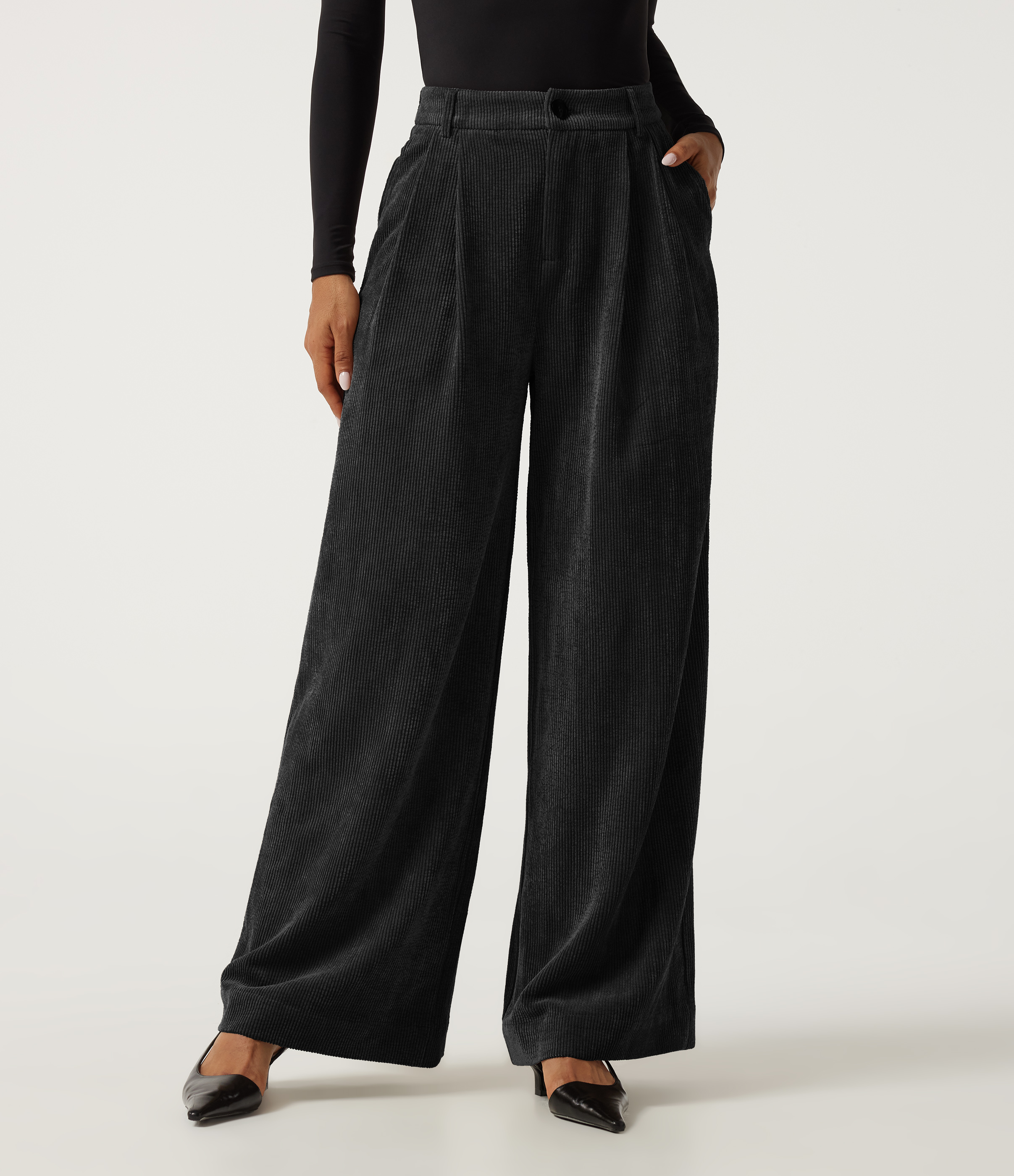 Pantalon en velours côtelé taille haute coupe large avec poches