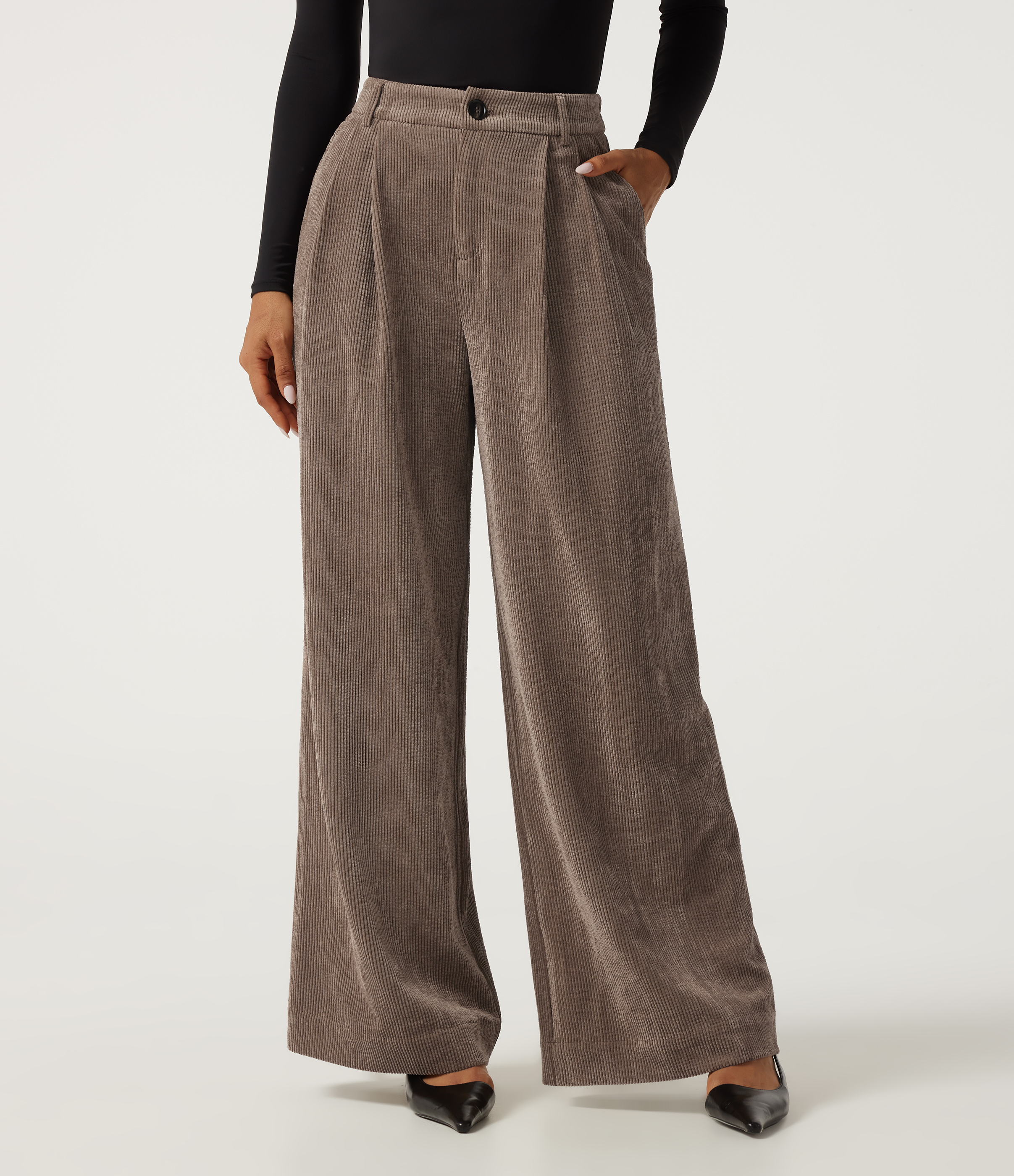Pantalon en velours côtelé taille haute coupe large avec poches