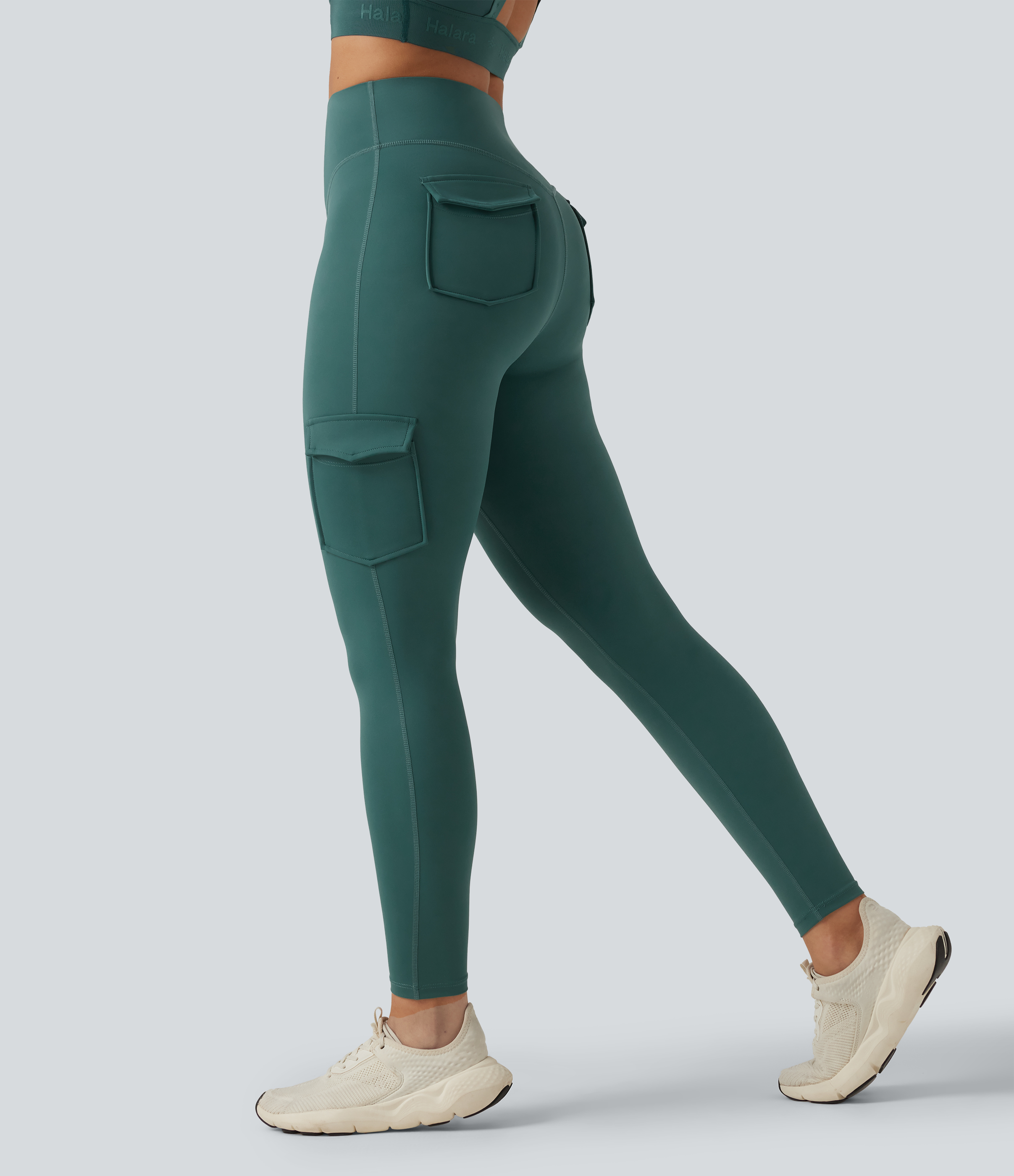 Viridian Hoch geschnittene, figurbetonte Laufleggings mit Taschen / 2