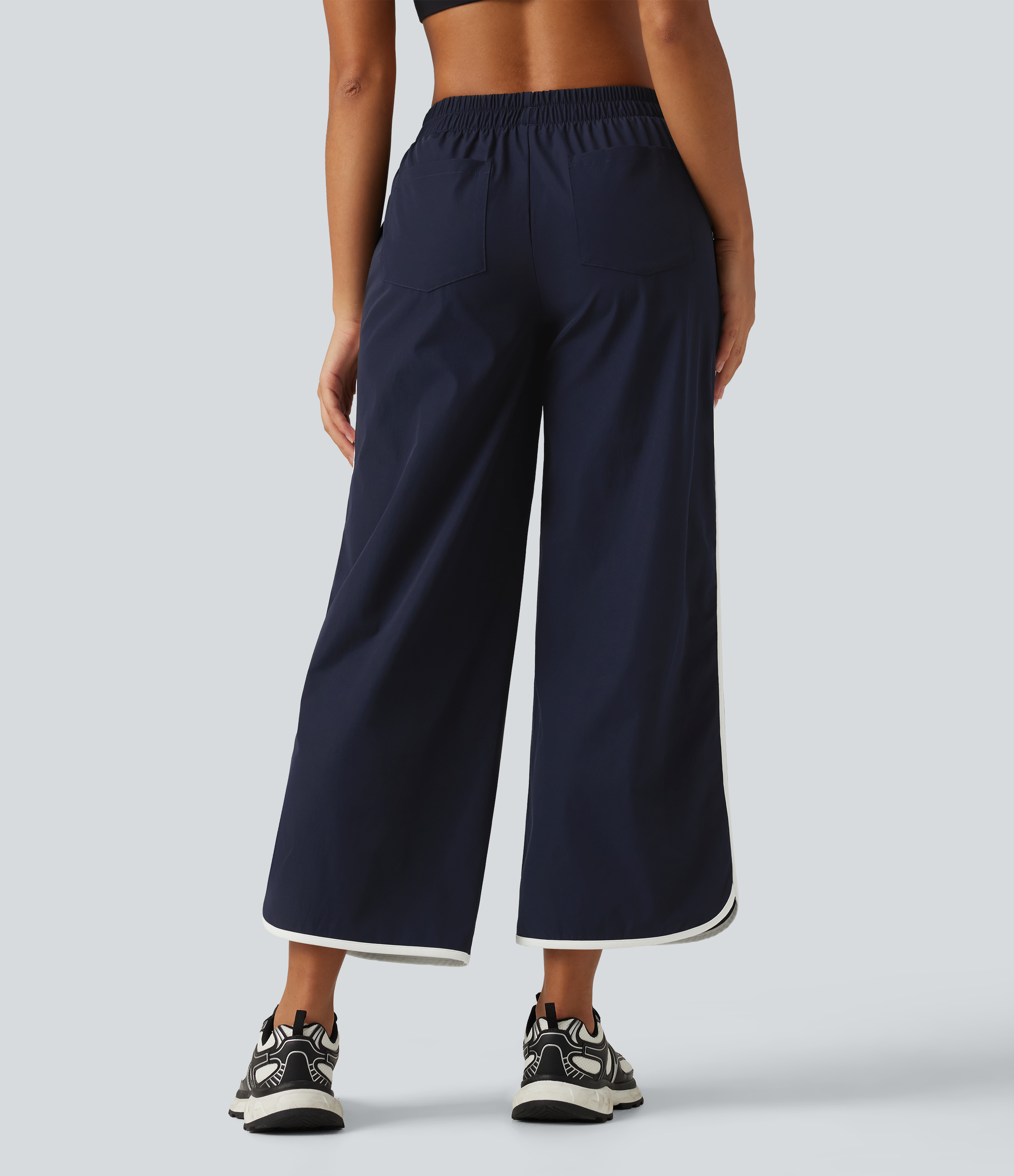 Dark Sapphire Pantalon de running à taille mi-haute, coupe large, ourlet arrondi et effet color block avec poches / 2