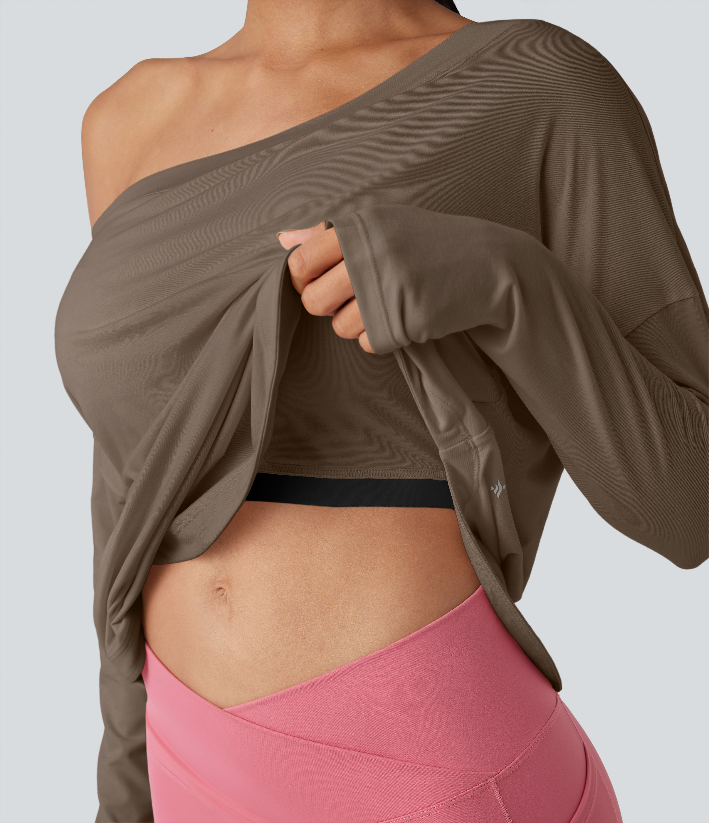 Yoga-Sport-Top mit integriertem BH, One-Shoulder-Design, langen Ärmeln, Daumenlöchern und gebogenem Saum - schnelltrocknend