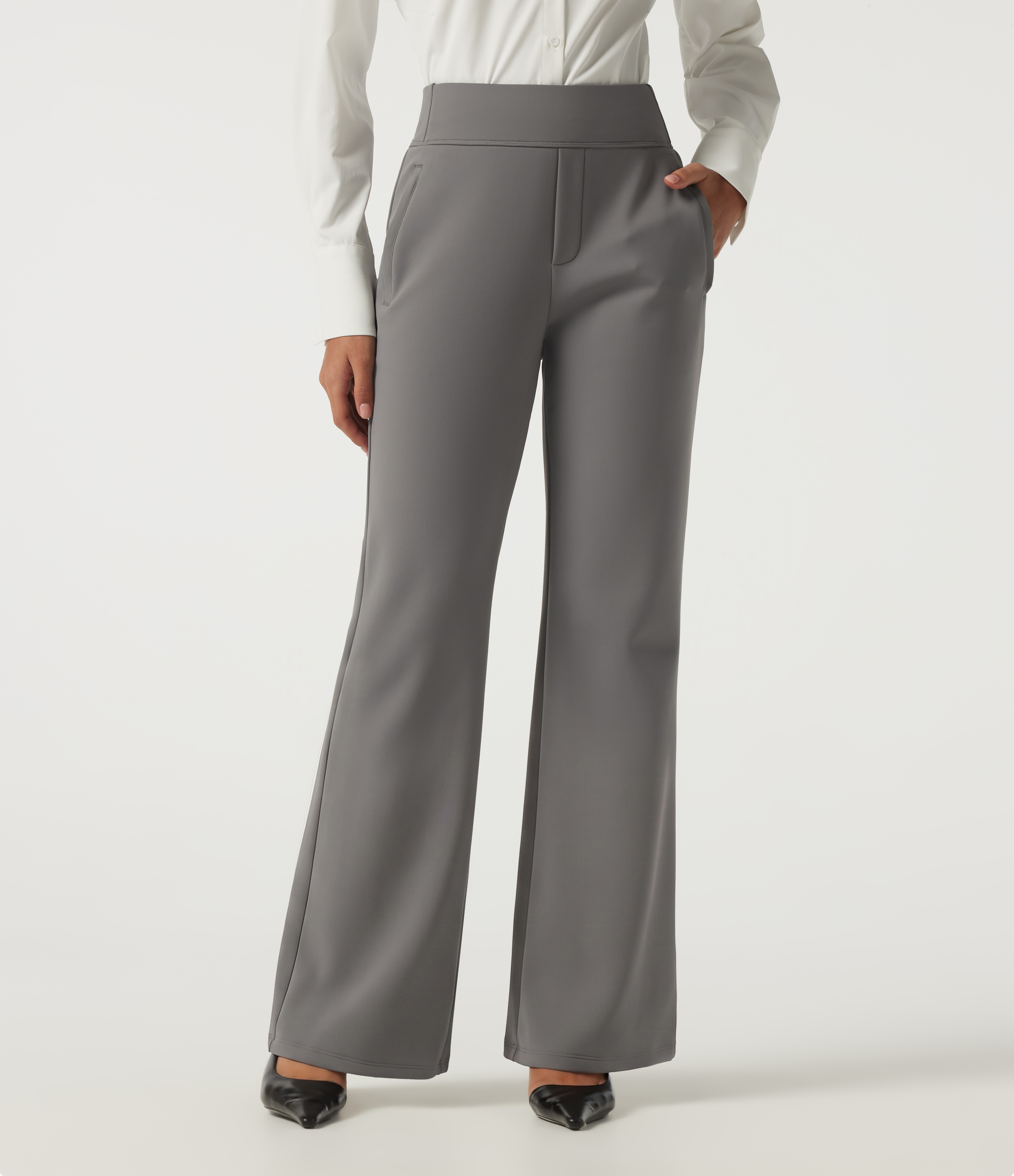 Pantalones de trabajo en forro polar, de talle alto y corte acampanado, con bolsillos