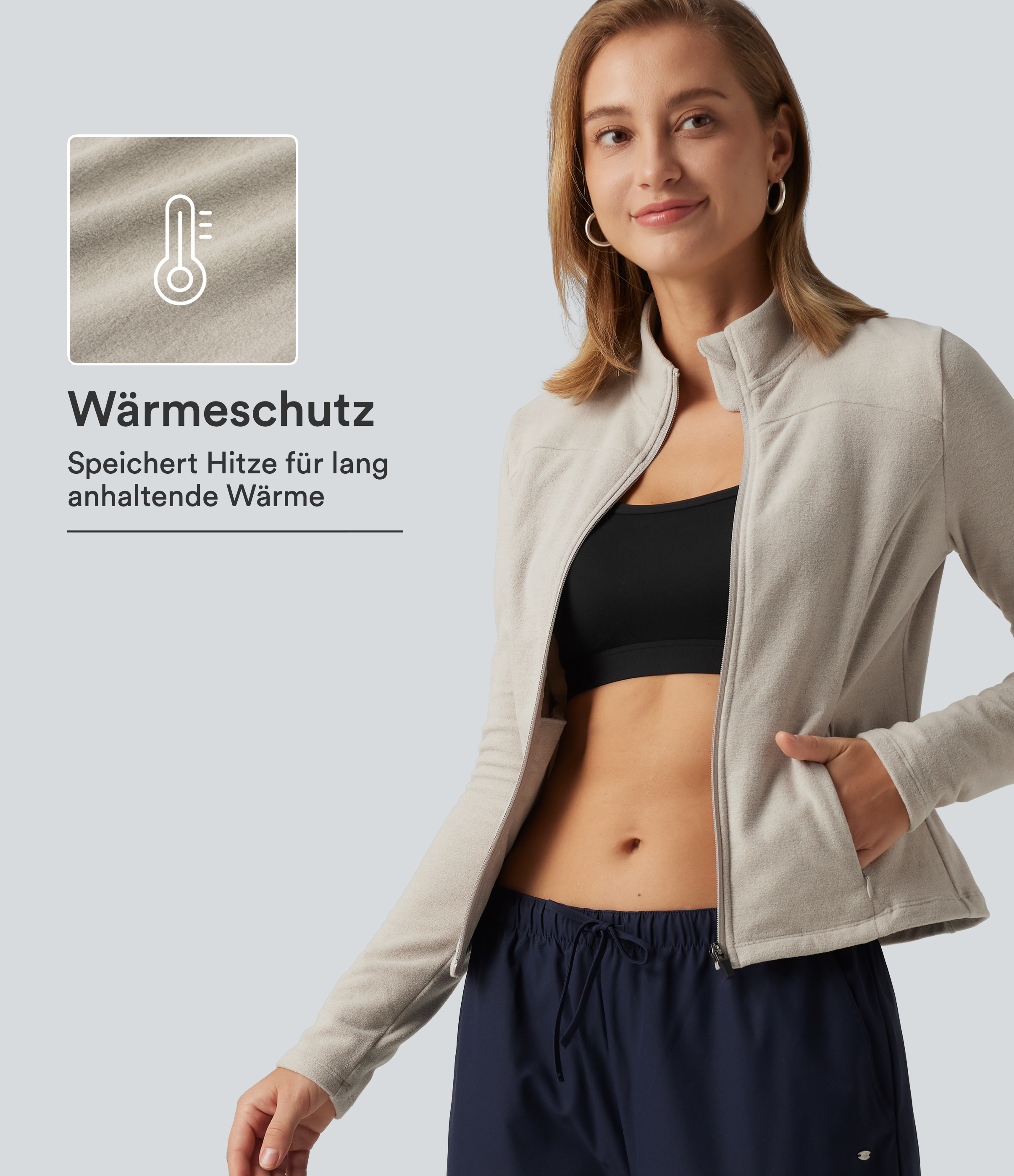 Fleece-Jacke mit Stehkragen, Seitentaschen und langen Ärmeln